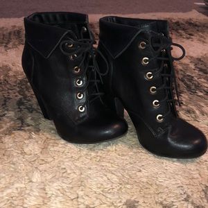 Black heeled combat boots